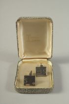 A PAIR OF LIBERTY SILVER CUFFLINKS, cased.