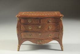 A SUPERB QUALITY LOUIS XVI DESIGN MINIATURE BOMBE COMMODE in kingwood with crossbanded inlaid top,