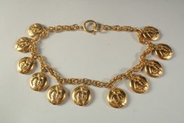 A VERY GOOD CHANEL NECKLACE with eleven emblems. 16ins long.