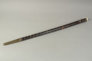 A RARE TELESCOPE WALKING STICK with screw off ivory top and the other end with screw fit brass