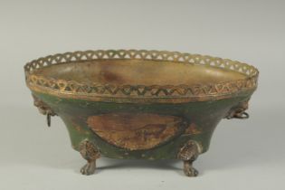 A 19TH CENTURY TOLEWARE OVAL JARDINIERE with two oval landscape panels, lion ring handles and