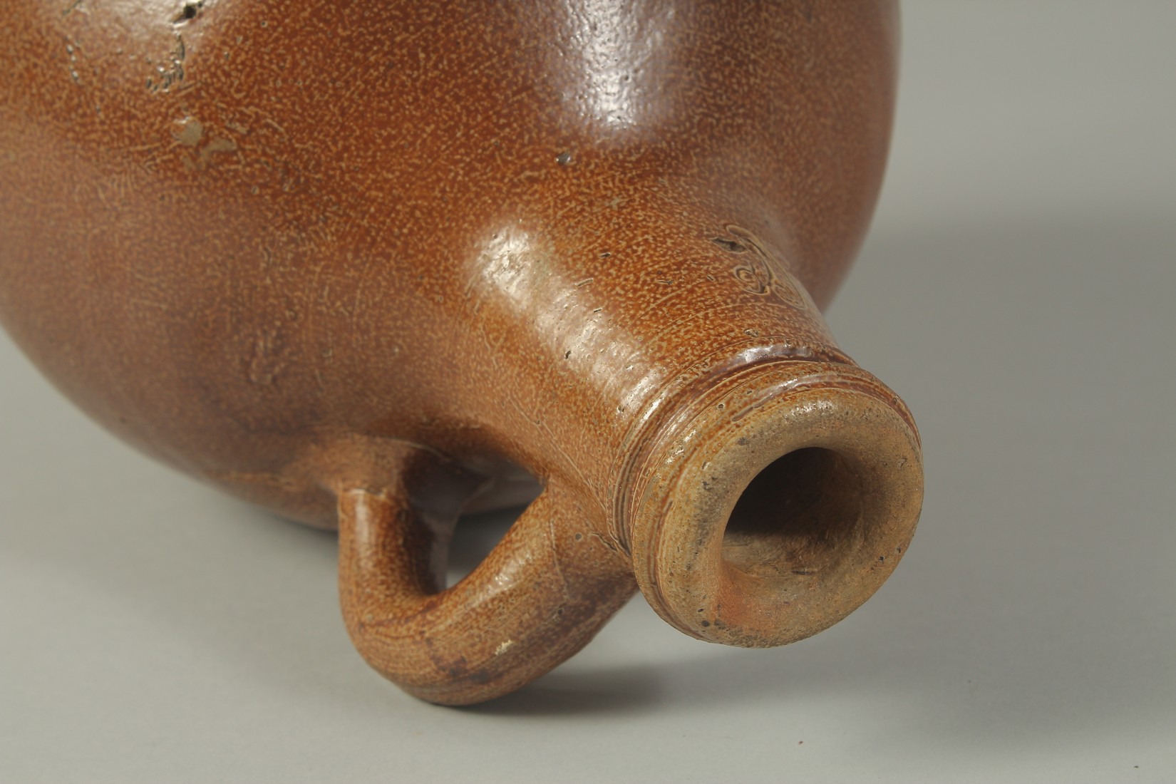 A GOOD LARGE BELLARMINE SALT GLAZED JUG. 11ins high. - Image 7 of 8