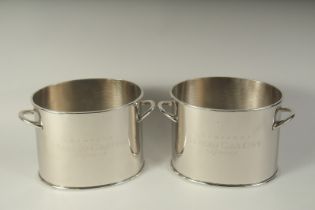 A PAIR OF ALFRED GRATIEN OVAL WINE COOLERS.