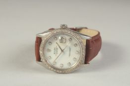 A VERY GOOD ROLEX MOTHER OF PEARL WATCH with diamond bezel and face, boxed.