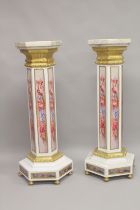 A SUPERB PAIR OF OCTAGONAL INLAID MARBLE COLUMNS with gilt metal mounts. 4ft high.