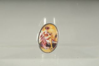 A SILVER PILL BOX, the lid with a nude. 3.5cms x 2.5cms.