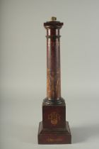 A 19TH CENTURY PAINTED TOLEWARE COLOURED LAMP. 17ins high.