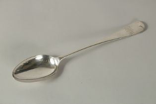 A LONG HANDLED SILVER SERVING SPOON. London 1903. Maker Walker and Hall.