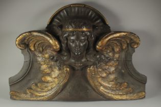 A VERY GOOD CARVED OAK AND GILDED WING ANGEL. Possibly 17th Century. 2ft 10ins long, 1ft 10 ins