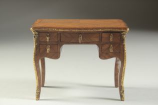 A SUPERB QUALITY LOUIS XVI DESIGN MINIATURE WRITING TABLE in kingwood with quartered top, metal