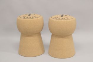 A PAIR OF CHAMPAGNE CORK STOOLS. 1ft 7ins high.
