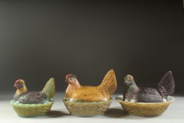 THREE VICTORIAN PAINTED OPALINE CHICKENS AND NESTS.