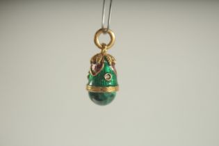 A RUSSIAN SILVER AND MALACHITE EGG PENDANT.