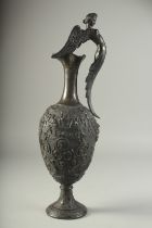 A VERY GOOD CLASSICAL BRONZE EWER with winged female handle. 19ins high.