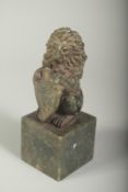 A CARVED JADE LION SEAL on a square base. 6ins high.