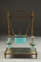A GOOD CIRCA 1900 FRENCH GILT METAL DRESSING TABLE SET with two glass bottles and mirror base.