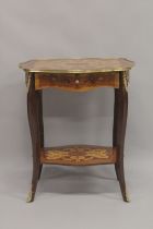 A LOUIS XVITH DESIGN INLAID RECTANGULAR TOP TABLE with curving legs and under tier. 1ft 1ins