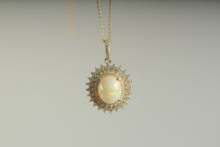 A SILVER GOLD PLATED OPAL PENDANT AND CHAIN, boxed.