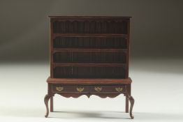 A GOOD 18TH CENTURY DESIGN MINIATURE WELSH DRESSER, the top with three shelves on a base with two