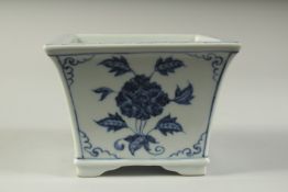 A CHINESE BLUE AND WHITE SQUARE FORM PLANT POT, 9cms high.