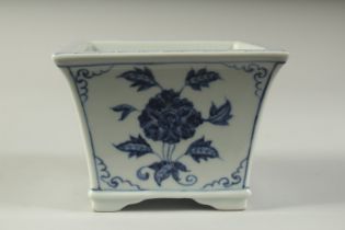 A CHINESE BLUE AND WHITE SQUARE FORM PLANT POT, 9cms high.