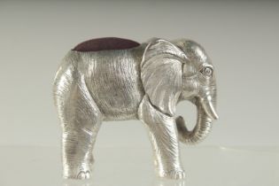 A LARGE SILVER PLATE ELEPHANT PIN CUSHION. 7cms high.