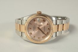 A GOOD ROLEX STEEL AND GOLD DATE JUST WRIST WATCH with paperwork and box. 409 G 534235.