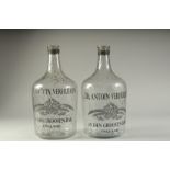 A PAIR OF SPECKLED GLASS BOTTLES "CH ANTOIN VERHULPEN". 14ins high.