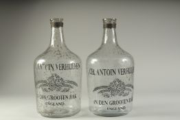 A PAIR OF SPECKLED GLASS BOTTLES "CH ANTOIN VERHULPEN". 14ins high.