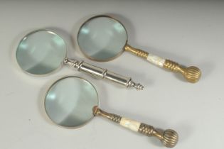 THREE VARIOUS MAGNIFYING GLASSES.