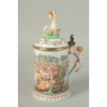 A GOOD CAPODIMONTE PORCELAIN LIDDED TANKARD, the lid with a cupid, the body with a classical scene