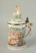 A GOOD CAPODIMONTE PORCELAIN LIDDED TANKARD, the lid with a cupid, the body with a classical scene