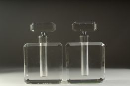 A PAIR OF HEAVY GLASS SCENT BOTTLES AND STOPPERS. 10ins high.
