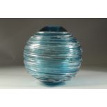 A GOOD WILLIAM YEOWARD BLUE TINTED BULBOUS GLASS VASE. 10.5ins high.