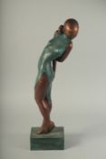 A TWO COLOUR BRONZE ABSTRACT GIRL. 26ins long.