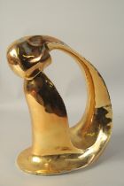 A HEAVY GILT BRONZE ABSTRACT SCULPTURE.