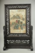A CHINESE PORCELAIN SCREEN, Trees and Mountains. Signed. 13ins x 9ins in a wooden frame.