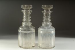 A GOOD PAIR OF LARGE GEORGIAN GLASS DECANTERS AND STOPPERS. 11.5ins high.