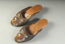 A PAIR OF TURKISH AND BEADWORK SHOES.