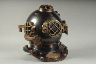 A REPLICA DIVER'S HELMET.