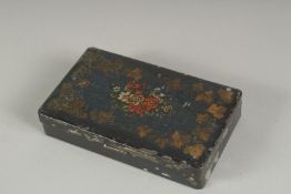 A VICTORIAN BLACK TIN BOX the inside holding an erotic picture. 4.25ins long.