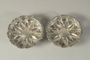 A PAIR OF REPOUSSE SILVER BON BON DISHES. Birmingham. 4.25ins diameter.