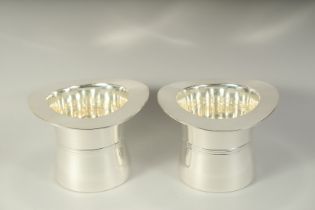 A PAIR OF TOP HAT PLATED WINE COOLERS.