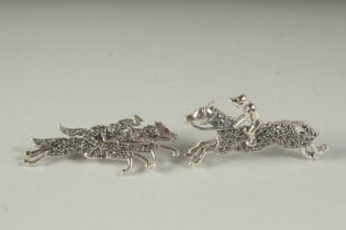 TWO SILVER MARCASITE HORSE RACING BROOCHES, boxed.