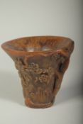 A GOOD LARGE CHINESE CARVED LIBATION CUP. 5.5ins high.
