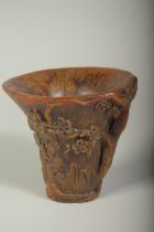 A GOOD LARGE CHINESE CARVED LIBATION CUP. 5.5ins high.
