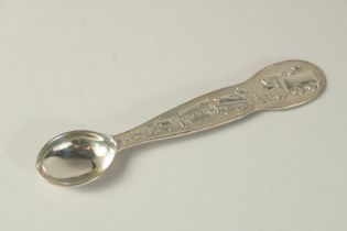 A TIFFANY CHILD'S SPOON in a Tiffany box.