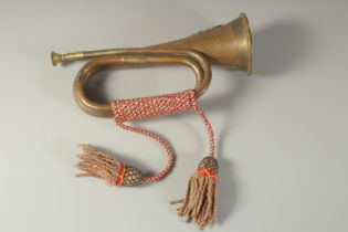 AN ARGYLL AND SUTHERLAND BRASS BUGLE.