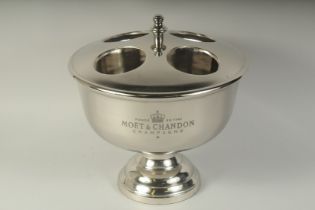 A MOET & CHANDON FOUR BOTTLE CIRCULAR WINE COOLER. 14ins diameter.