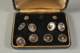 A KREMENTZ SET OF SILVER AND MOTHER-OF-PEARL DRESS STUDS AND CUFFLINKS, cased.